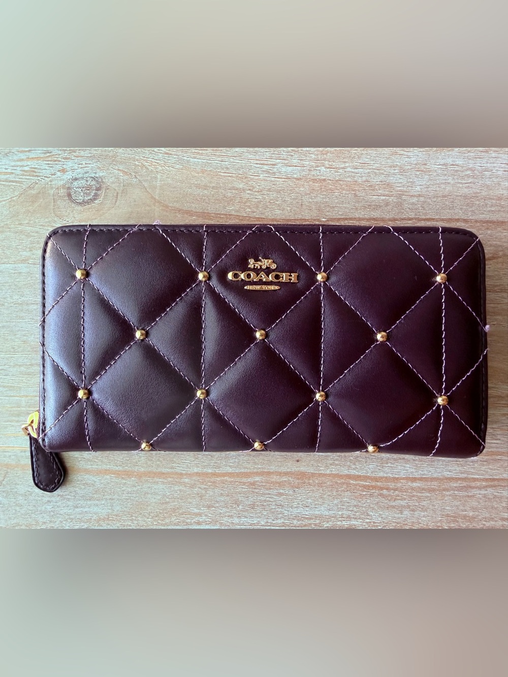 Coach Quilted Zip-Around Wallet in Deep Plum with Gold Hardware